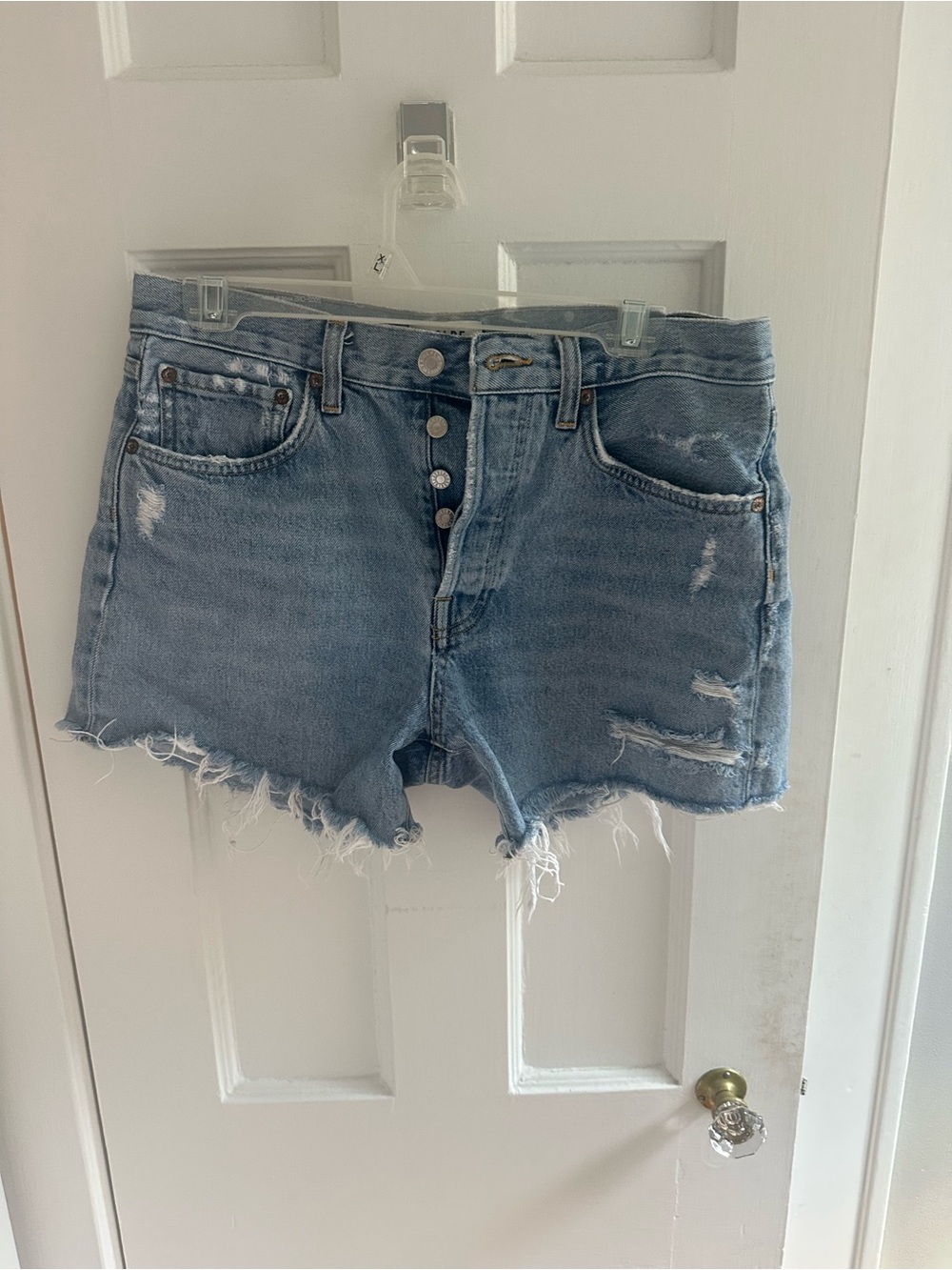 Agolde Light Blue Distressed Denim Cutoff Shorts
